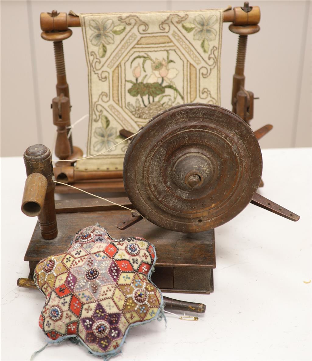 A Victorian bead and patchwork star-shaped pin cushion by M E Ashmore 1884 and two other items, W 20cm (cushion)